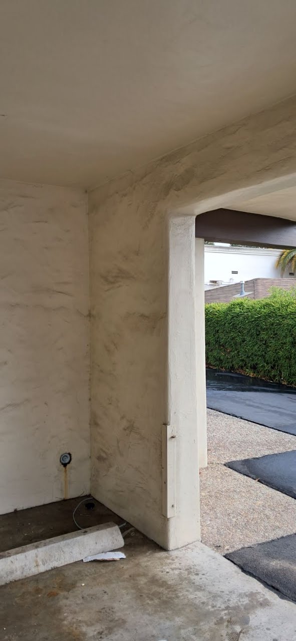 Looking out the doorway of a stone house