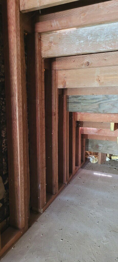 underside of a staircase being repaired 2